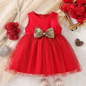 Vestido rojo con malla y lazo dorado