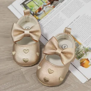 Zapatos Mery Jane dorados con bordado de corazón