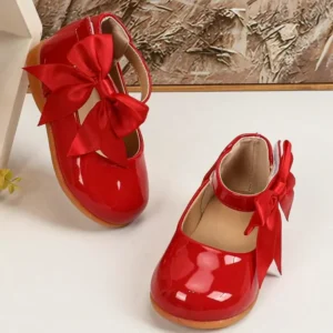 zapatos planos suaves rojos con lazo