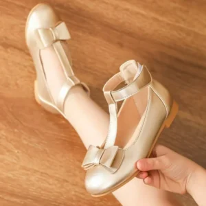 Zapatos de muñeca dorados con lazo y velcro