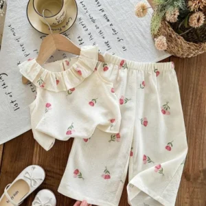 Conjunto de blusa con volantes y pantalón estampado floral