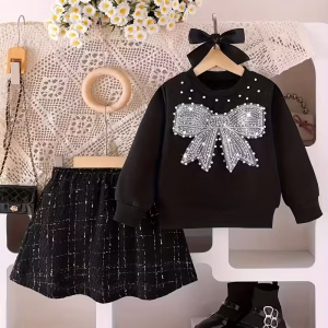 Conjunto de sudadera con lazo de perlas y falda a cuadros