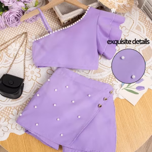 Conjunto lila blusa y falda short con perlas