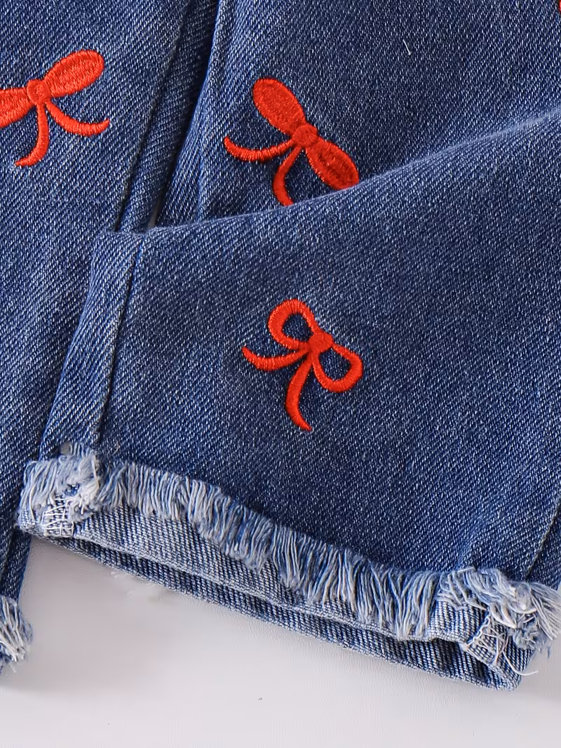 Conjunto blusa roja y pantalón con bordado de lazo