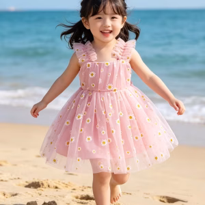 Vestido rosado con tul estampado de margaritas lazo posterior
