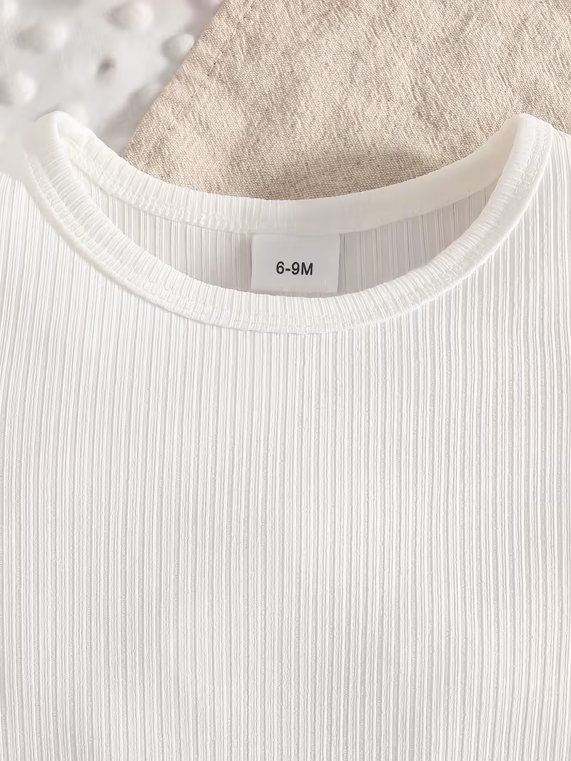 Blusa overol vestido con bordado de lazo y cintillo