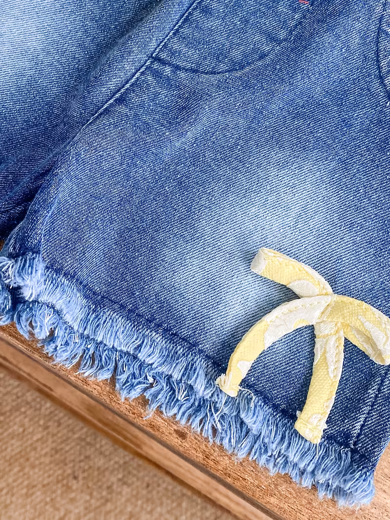 Conjunto 2 piezas blusa amarilla jacquard + shorts con lazo