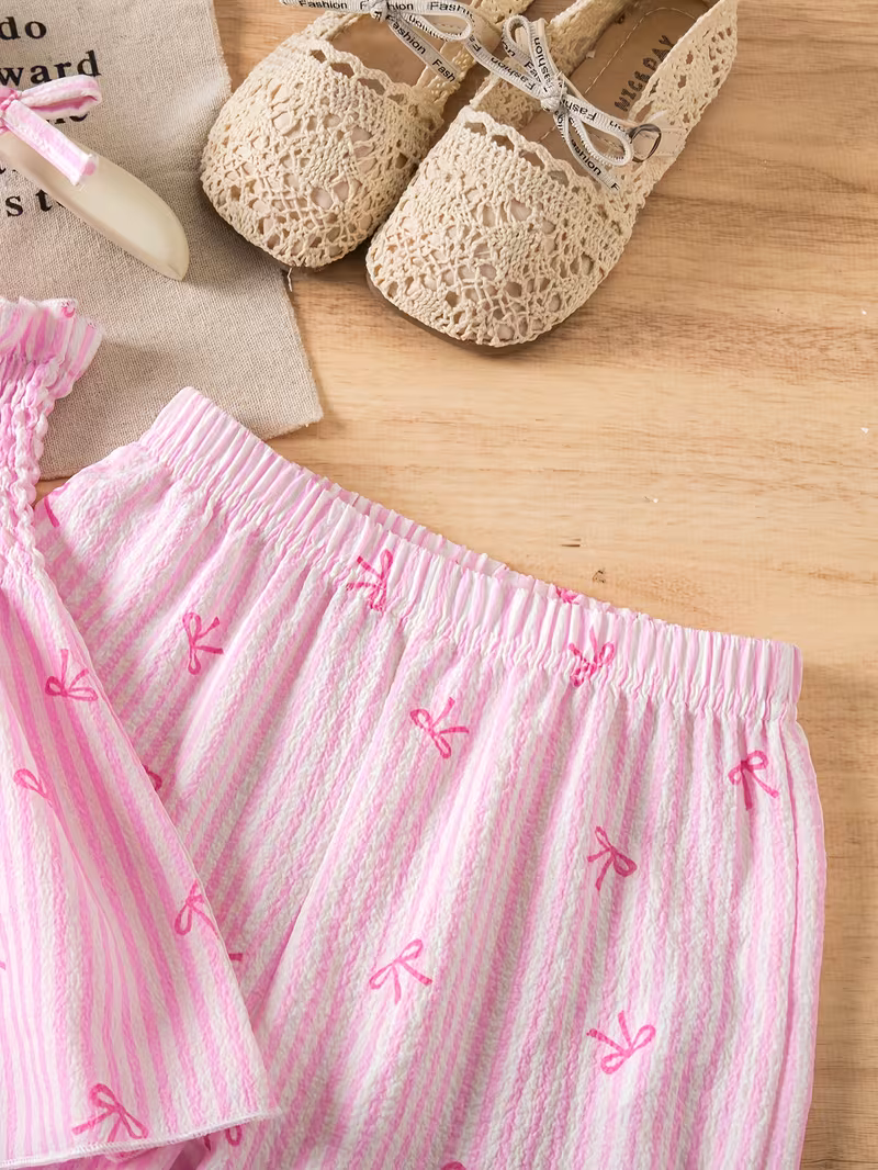 Conjunto 2 piezas veraniego rayado rosado con estampado lazos