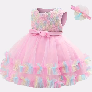 Vestido rosado arcoíris con tul y cintillo